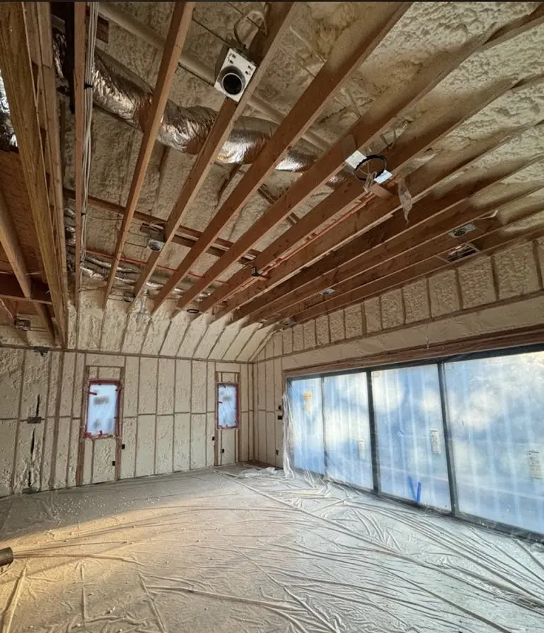 Interior walls and ceiling insulated with spray foam during new construction in St. Augustine Beach